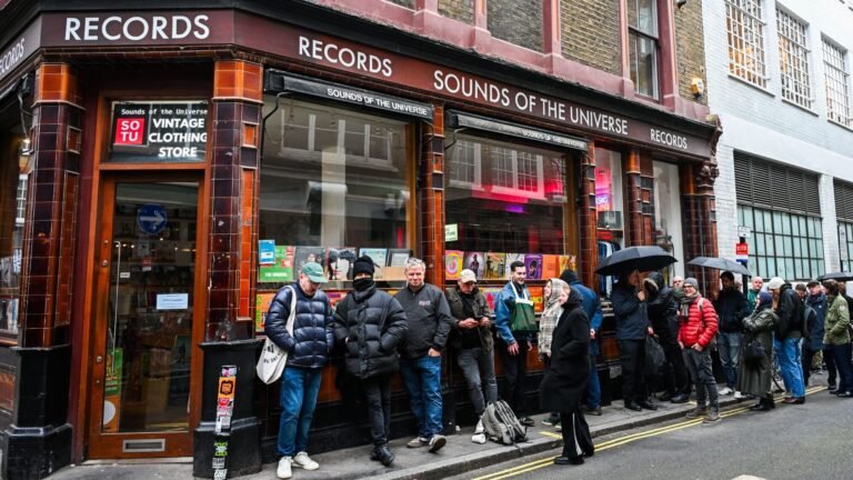 . Music fans gather outside the Sounds of the Universe record store, April 2026. Ben Montgomery/Getty Images