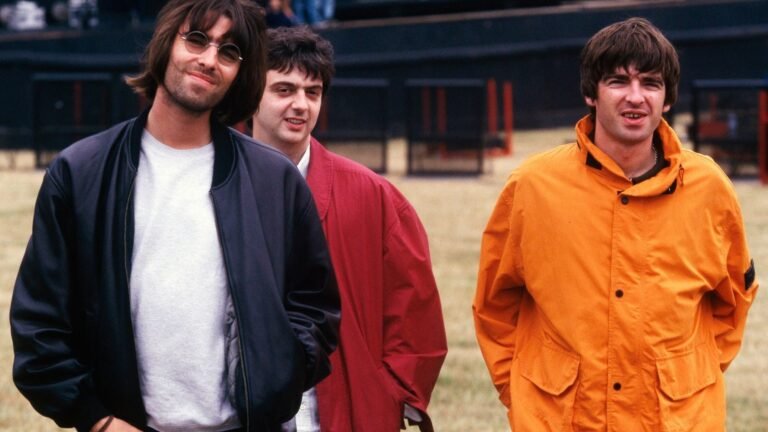 Oasis. Liam Gallagher, Paul 'Guigsy' McGuigan and Noel Gallagher, 1996. Mick Hutson/Redferns/Getty