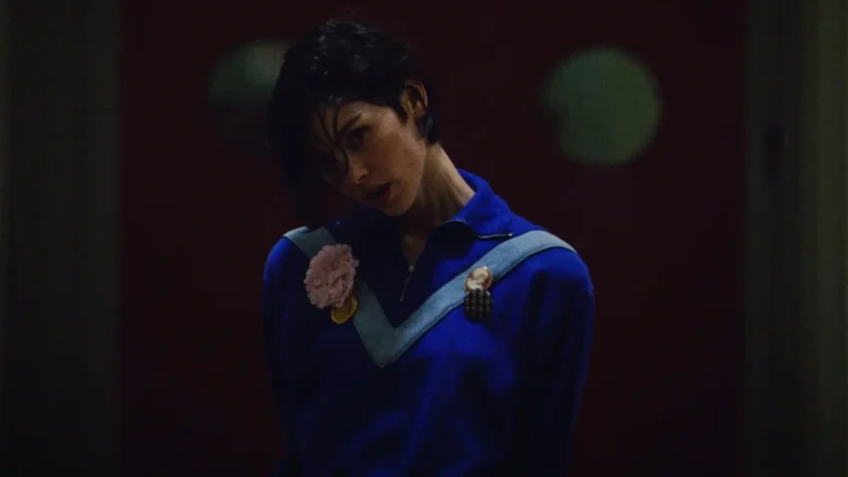 Gracie Abrams. in the music video for 'Hit the Wall'
