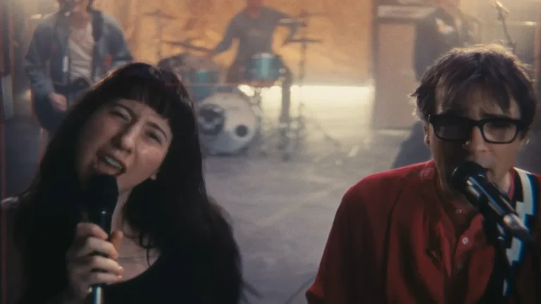 Weezer. Wednesday's Karly Hartzman and  in 'We Might As Well Be Strangers'