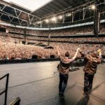 Fãs do Oasis decifram vídeo e especulam turnê de 2027 começando em Glasgow